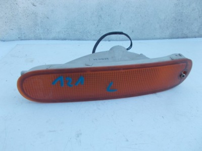 Mazda 121 поворотник поворотник лівий оригінал фото №1