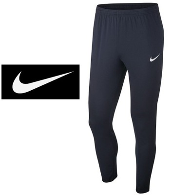 Nike spodnie dresowe Junior czarne z kieszeniami r.140