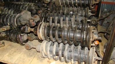 Nissan navara d40 pathfinder r51 амортизатор амортизационная стойка передний перед oryg. фото №1