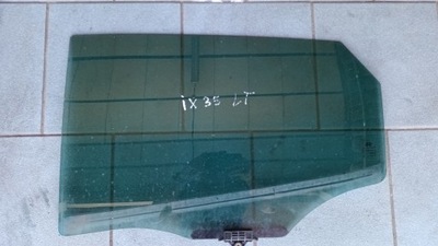 Hyundai ix35 стекло дверь левый задняя фото №1