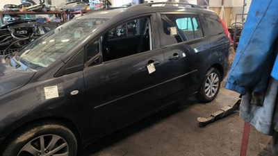 Двері ліва перед сріблястий mazda 5 i cr фото №1