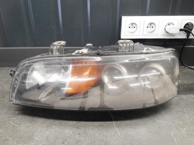 89100449 фара левый fiat punto ii фото №1