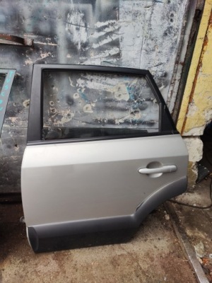 Hyundai tucson i kia sportage ii двері лівий ліва задня задні повний фото №1