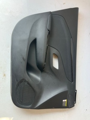 Обшивка двері лівий перед corsa f фото №1