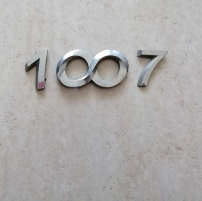 EMBLEMA INSCRIPCIÓN PEUGEOT 1007 PARTE TRASERA TAPA DE MALETERO  