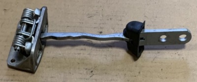 Обмежувач двері лівий задня audi a2 8z0837429 фото №1