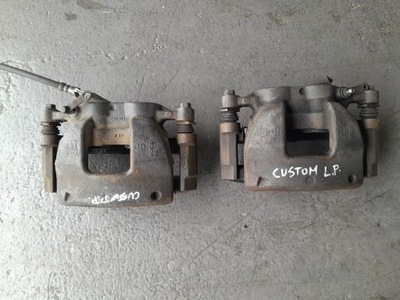 Ford transit custom mk8 12- суппорт тормозной перед фото №1