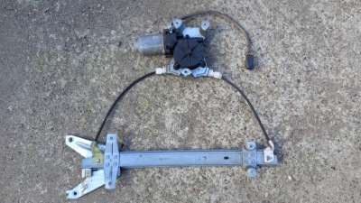Підйомник скло лівий перед nissan primera 01r 2.0d фото №1