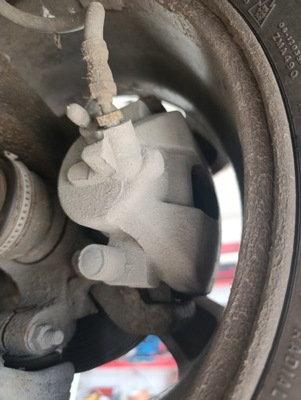 Супорт гальма перед передній лівий mazda 3 fl фото №1