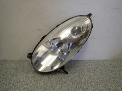 Nissan micra k12 03-07 фара левый лампа перед фото №1