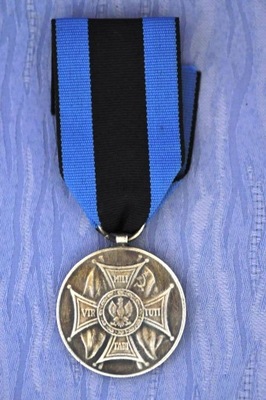 Srebrny Medal „Zasłużonym na Polu Chwały”