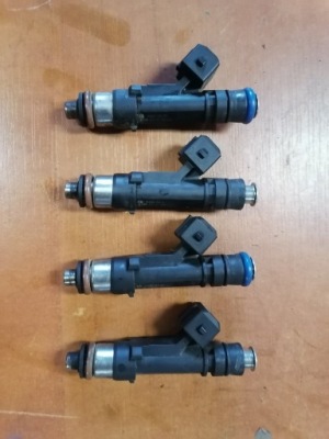 Інжектор форсунки opel corsa e adam 1.4 фото №1