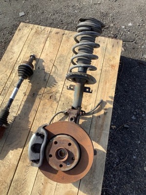 Kangoo ii z.e амортизатор поворотний кулак лівий перед фото №1