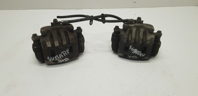 Subaru forester ii суппорт тормозной передний левый фото №1