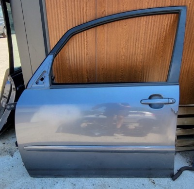 Двері ліва передні лівий перед toyota corolla verso 8n6 повний фото №1