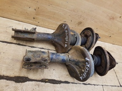 Амортизаторы перед комплект mitsubishi lancer vii фото №1