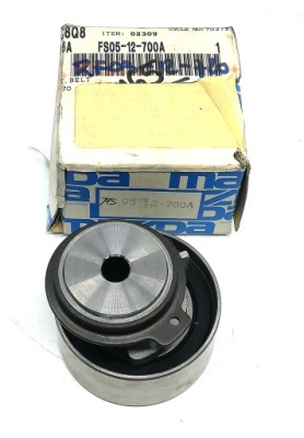 Натягувач ремінь розподільного валу mazda 323 fs0512700a oe! фото №1
