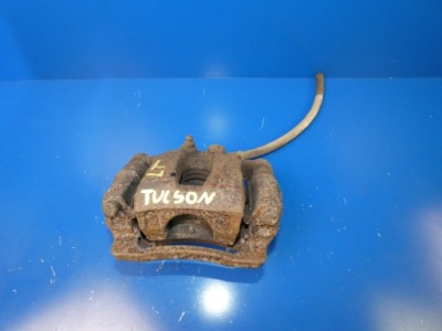 Hyundai tucson iii супорт гальмівний лівий задня фото №1