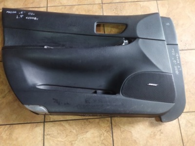 Обшивка двері лівий перед mazda 6 2.citd 02' kom фото №1