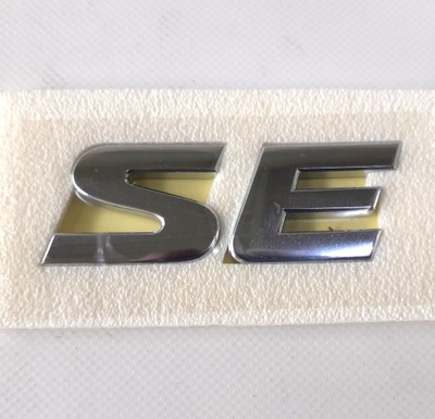 EMBLEMAT NAPIS "SE" CHEVROLET ORYGINAŁ