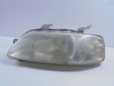 Aveo i t200 фара левый h4 0301-002029 фото №1
