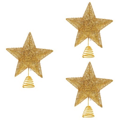 Złoty świecznik w kształcie gwiazdki na czubku choinki