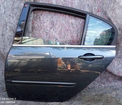 Renault laguna iii hb двері ліва задня фото №1