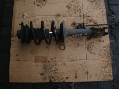 Kia sportage iii амортизатор левый передний фото №1