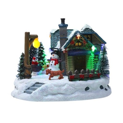 Świąteczna dekoracja śnieżnego domu ze światłami d