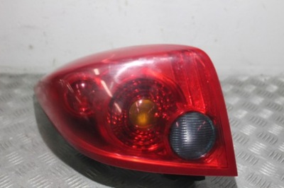 Лампа права задня nissan primera p12 фото №1