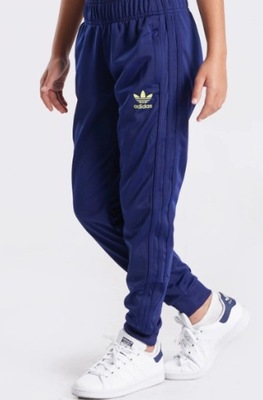 SPODNIE ADIDAS ALLOVER PRINT SST PANTS R. 140