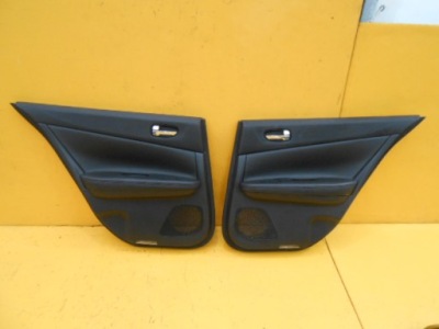 Nissan maxima a35 2009 - обшивка двері задня фото №1