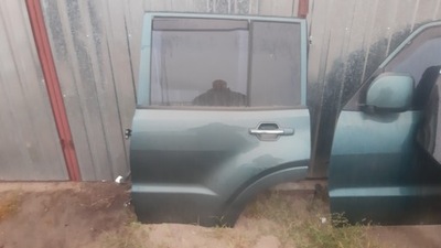 Двері лівий задня pajero iii 5d фото №1