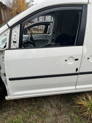 Двері лівий перед vw caddy iii lift lb9a фото №1