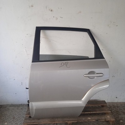 Hyundai tucson i двері ліва задня сріблясті фото №1