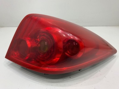 Лампа лівий задня nissan primera p12 89077070 хетчбек світло фото №1