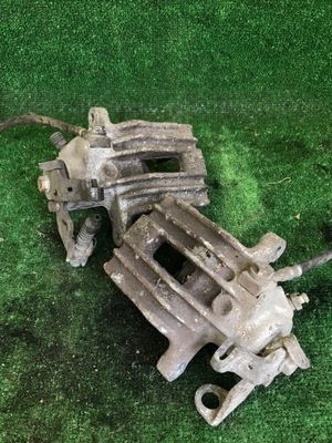 Супорт гальмівний задня задній roomster rapid лівий фото №1