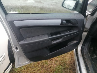 Обшивка передній лівий opel zafira b фото №1