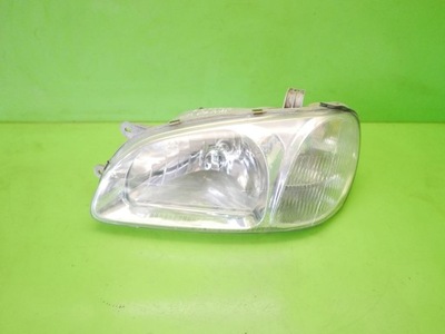 Фара лампа ліва перед kia carnival i 99-01 фото №1