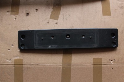 Kia rio iii lift основание кронштейн номерного знака перед 86519-1w700 рамка фото №1