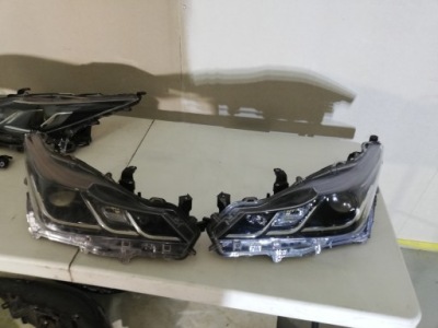 Toyota corolla e21 sedan лампа левая перед обычная фара eu фото №1