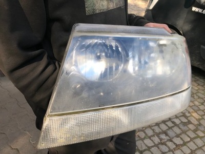 Jeep grand cherokee wj - фара левый фото №1