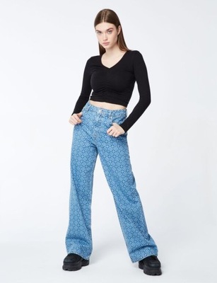 JENNYFER_SPODNIE JEANS W KWIATKI R.38