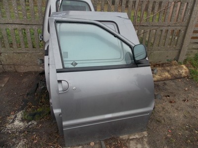 Двері передні ліва праве nissan vanette cargo 94- фото №1