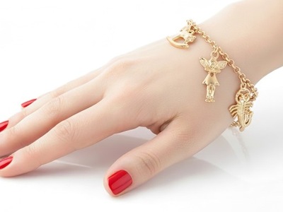 Złota bransoletka Charms