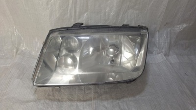 Vw bora лампа передняя левая фара 1eh963560-63 фото №1