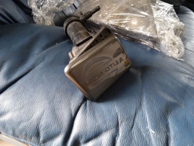 Nissan primera p12 омивач фара правий фото №1