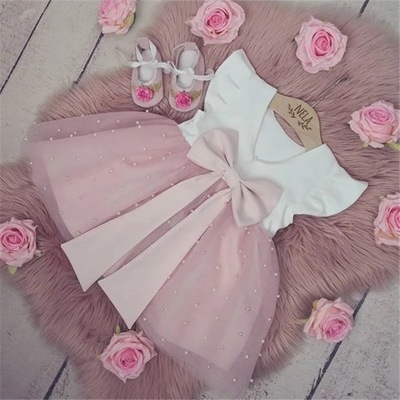 Sukienka biało różowa tiul kokarda perełki 134/140