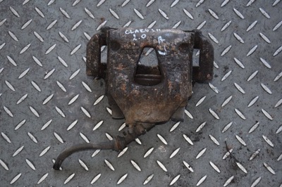 Суппорт тормозной левый перед kia clarus ii 2.0 фото №1