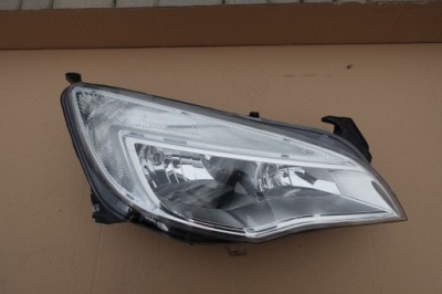 Opel astra iv lift лампа передня права оригінал 1eg010011-321 фото №1